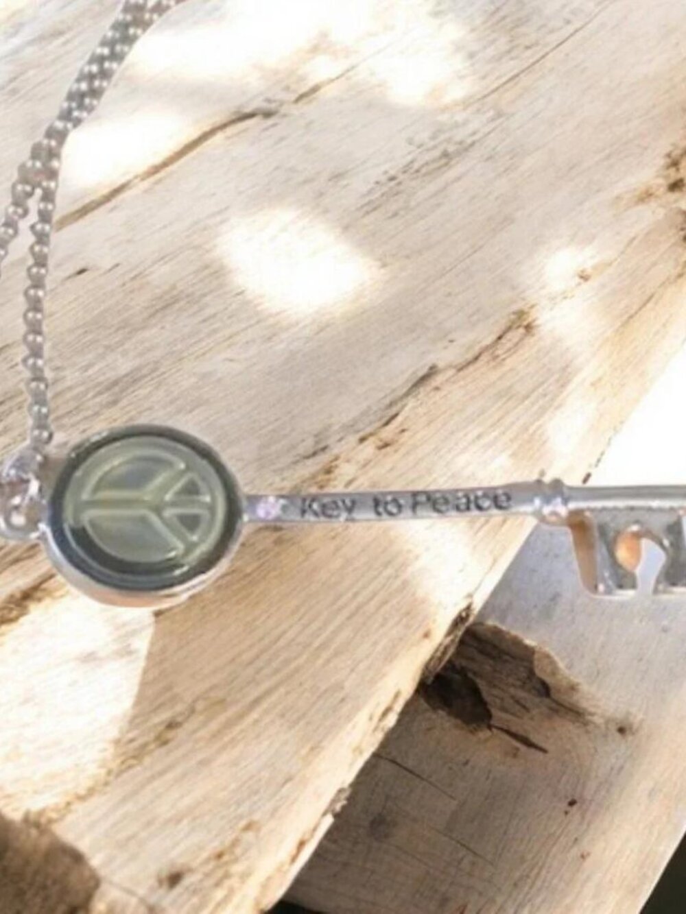 VINTAGE KEY TO PEACE/SAVE THE PLANET KEY NECKLACE